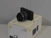 Nikon j1 + 30/110