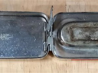 Oude haarkruller houder