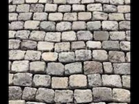 Oude zandstenen straatkeien