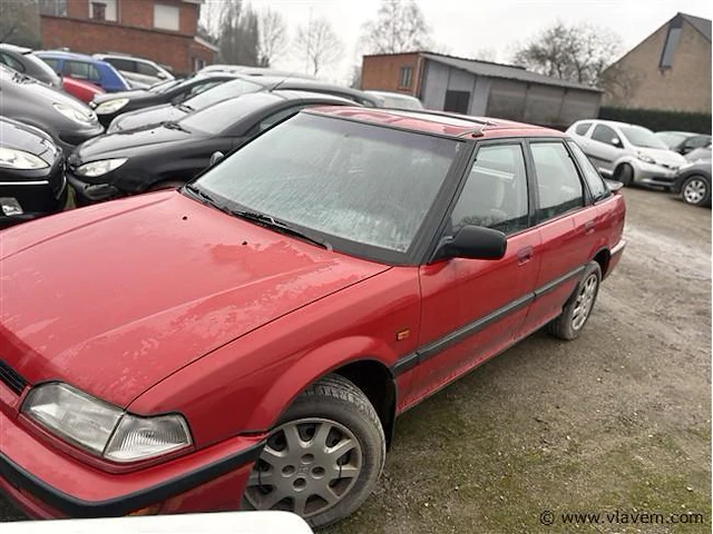 Personenauto - afbeelding 1 van  7