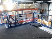 Plm 100m² mezzanine bestaande uit plm 50 dragende leggers, houten bovenvloer, railing en trap - afbeelding 9 van  11