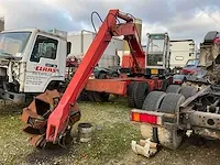 Poclain tys 4x4 banden graafmachine