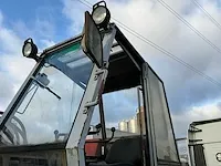 Poclain tys 4x4 banden graafmachine - afbeelding 18 van  21