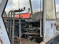 Poclain tys 4x4 banden graafmachine - afbeelding 19 van  21