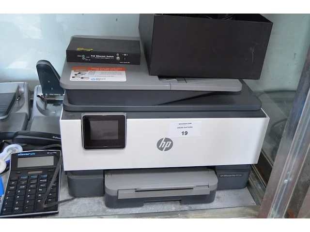 Printer hp office jet pro 9010e , telefoontoestel grandstream gxv3240 , telefoontoestel yealink sip-t42y ultra elegant gigabit ip phone , kantoormateriaal w.o. perforator, mappen, nietjesmachine, enz (9,12,15,16) - afbeelding 2 van  7