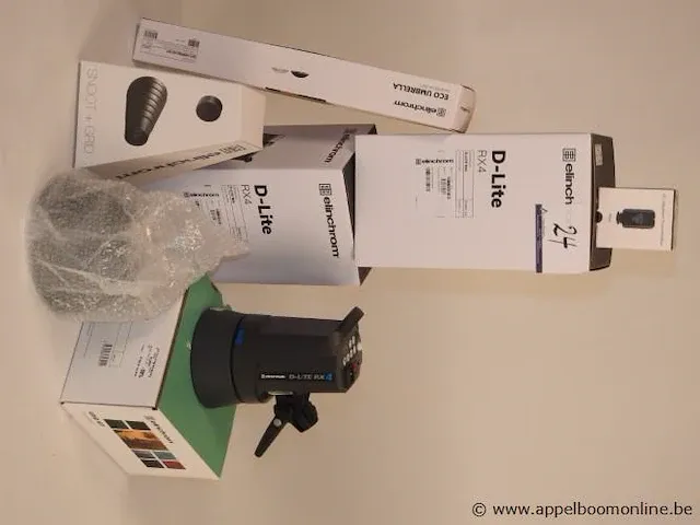 Professionele fotografieset bestaande uit : 2 flitsers elinchrom d-lite rx4, 2 paraplus, snoot plus grid set, zender, refelctor en gridset - afbeelding 1 van  1