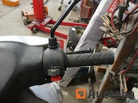 Qingqi qm50qt-6 scooter (2005-2.055 km) - afbeelding 11 van  12