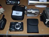 Radio medion, dockingstation, 2 fototoestellen, 6 gps tom tom zonder kabels, walkietalkie, usb lamp grundig, headset jabra, fm transmitter - afbeelding 6 van  8