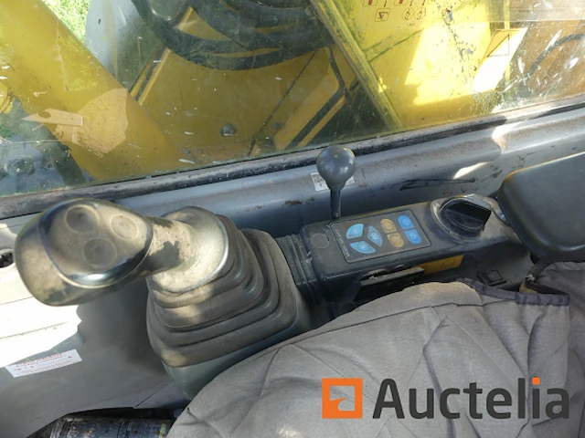 Rupsgraaflaadmachine new holland e70 sr - afbeelding 16 van  24