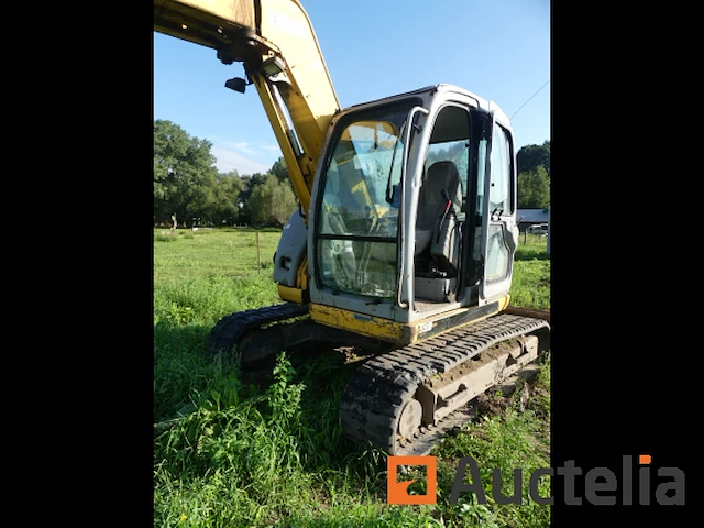 Rupsgraaflaadmachine new holland e70 sr - afbeelding 18 van  24