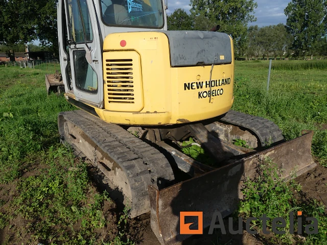 Rupsgraaflaadmachine new holland e70 sr - afbeelding 21 van  24