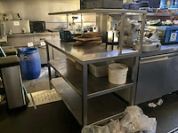 Rvs werktafel van plm. 140 x 70 x 90 cm hoog met opstand - afbeelding 1 van  7
