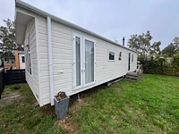 Stacaravan willerey, type lumic 32 x 12 2 bed, 2 slaapkamers, badkamer, gasketel, volledig ingebouwde keuken inclusief meubels, met tuinhuis pvc ketter, waterton - afbeelding 10 van  73