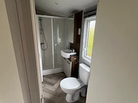 Stacaravan willerey, type lumic 32 x 12 2 bed, 2 slaapkamers, badkamer, gasketel, volledig ingebouwde keuken inclusief meubels, met tuinhuis pvc ketter, waterton - afbeelding 48 van  73