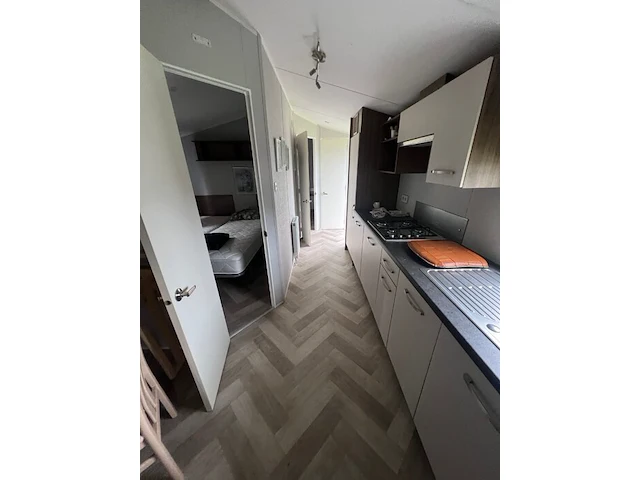 Stacaravan willerey, type lumic 32 x 12 2 bed, 2 slaapkamers, badkamer, gasketel, volledig ingebouwde keuken inclusief meubels, met tuinhuis pvc ketter, waterton - afbeelding 63 van  73