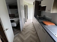 Stacaravan willerey, type lumic 32 x 12 2 bed, 2 slaapkamers, badkamer, gasketel, volledig ingebouwde keuken inclusief meubels, met tuinhuis pvc ketter, waterton - afbeelding 63 van  73