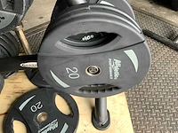 Technogym schijvenrek met 305kg schijven 8x schijven zijn nieuw - afbeelding 3 van  8
