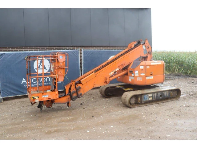 Telescoophoogwerker hitachi hx99b diesel 200kg 11.7m 2000 - afbeelding 1 van  1