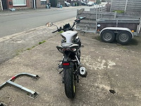 Um xtreet rs 125 xgj125-28b motorfiets - afbeelding 16 van  19