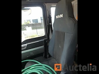 Vrachtwagen kipper met hijskraan man tgs (2014-390.250 km) - afbeelding 32 van  46