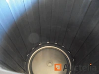 Vuilnisbakken en raamschrapers - afbeelding 2 van  4
