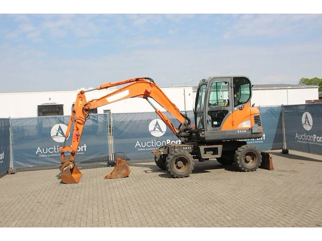 Wielgraafmachine doosan dx55w diesel 2015 - afbeelding 1 van  1