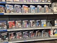 Winkelvoorraad en inrichting game mania kortrijk - afbeelding 34 van  328