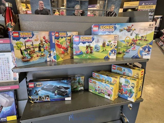 Winkelvoorraad en inrichting game mania merksem - afbeelding 13 van  467