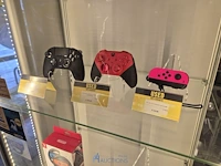 Winkelvoorraad en inrichting game mania merksem - afbeelding 63 van  467