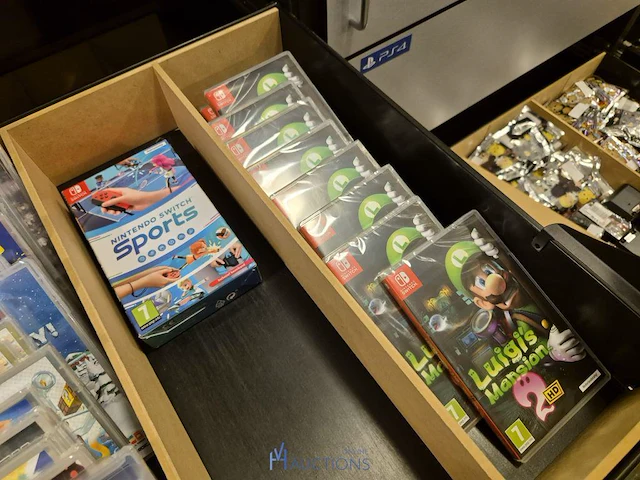 Winkelvoorraad en inrichting game mania merksem - afbeelding 241 van  467