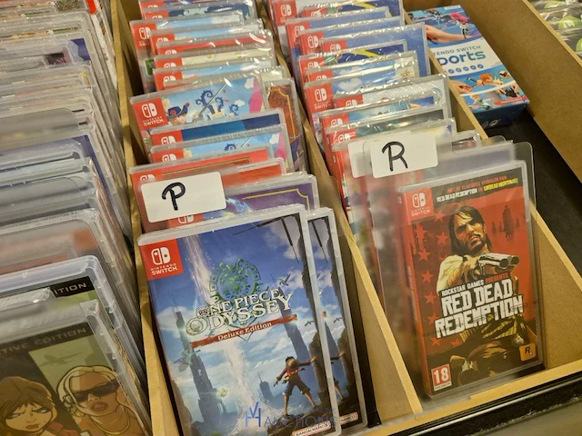 Winkelvoorraad en inrichting game mania merksem - afbeelding 242 van  467
