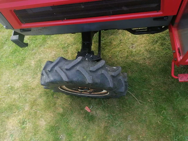Yanmar fx20d vierwielaangedreven minitractor met kipbak - afbeelding 5 van  16