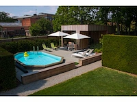 Zwembad oblong 390 x 620*133 cm met exotische afdekrand