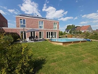 Zwembad oblong 460 x 810*146 cm met exotische afdekrand