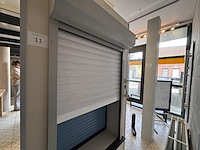 1 dubbele elektrische alu opbouw rolluik suys