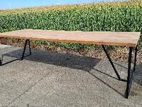 1 massief teakhouten tafel met universele zwarte poten - afbeelding 1 van  1