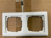 10 dozen dubbel afdekplaatjes gira