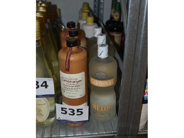 12x fles sterke drank, wo. erven lucas bols corenwyn (extra oude belegen, 38% vol) en cardinal melon schnapps (0.5l, 20% vol) - afbeelding 1 van  2