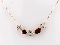 14 kt geelgouden ketting met hanger van 1,16 cts natuurlijke diamant en granaat - afbeelding 1 van  7