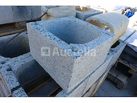 18 enkele betonnen bushels