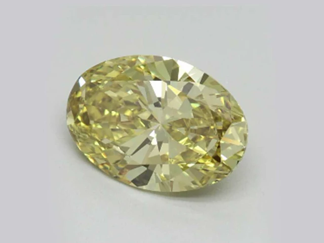 1,85 ct oval cut lichtgroene topaas – khaki groen - afbeelding 1 van  4