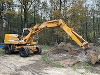 1989 liebherr a900b graaflaadmachine - 14 ton - met kentekenpapieren - afbeelding 1 van  29