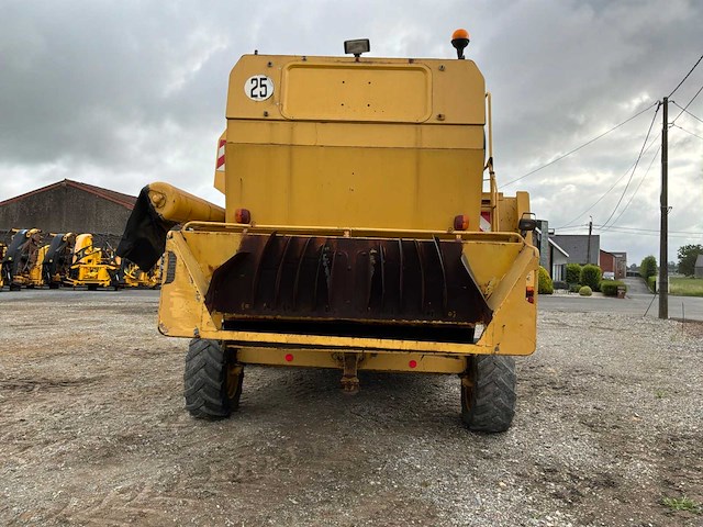 1995 new holland tx68 maaidorser met maaibord en kar - afbeelding 8 van  24