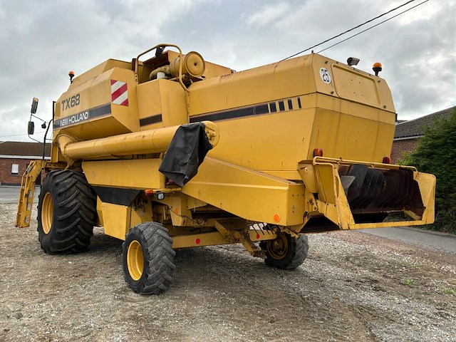 1995 new holland tx68 maaidorser met maaibord en kar - afbeelding 9 van  24