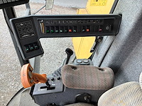 1995 new holland tx68 maaidorser met maaibord en kar - afbeelding 17 van  24