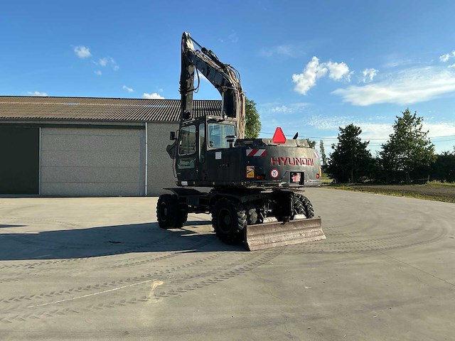1998 hyundai robex-130w banden graafmachine - afbeelding 34 van  45