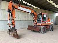 1998 liebherr 316 banden graafmachine - afbeelding 1 van  25