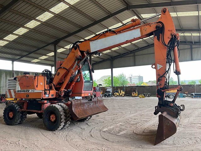 1998 liebherr 316 banden graafmachine - afbeelding 20 van  25