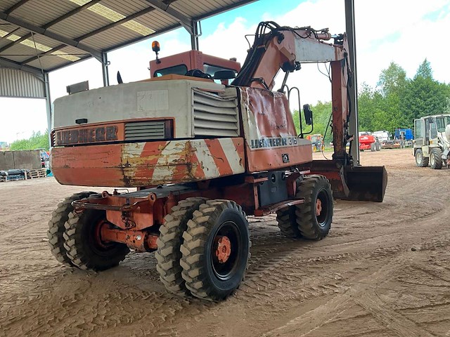 1998 liebherr 316 banden graafmachine - afbeelding 22 van  25
