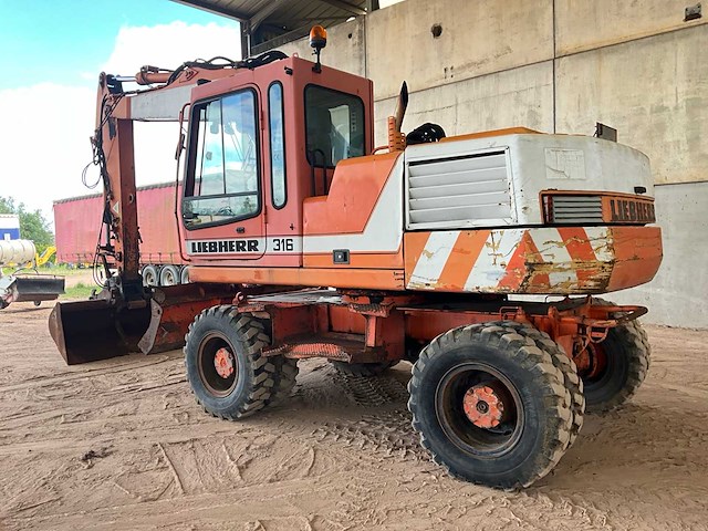 1998 liebherr 316 banden graafmachine - afbeelding 24 van  25